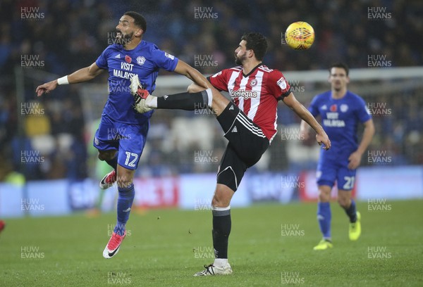 181117 - Cardiff City v Brentford, Sky Bet Championship - Liam Feeney of Cardiff City and Yoann Barbet of Brentford compete for the ball