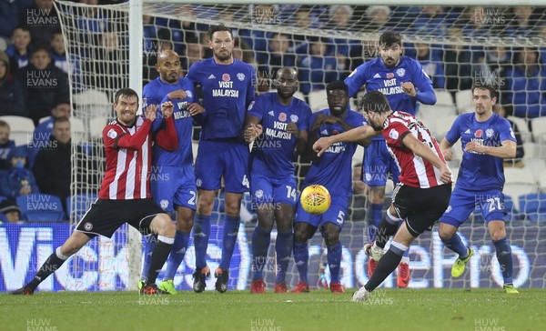 181117 - Cardiff City v Brentford, Sky Bet Championship - The Cardiff City defensive wall braces themselves as Yoann Barbet of Brentford takes a free kick