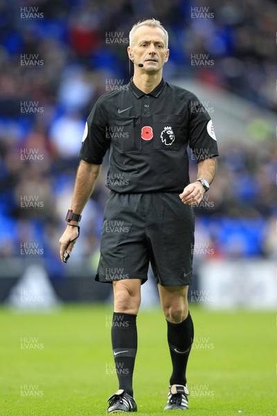 101118 - Cardiff City v Brighton & Hove Albion, Premier League - Referee Martin Atkinson Officials and players wore shirts bearing a Poppy emblem in Remembrance