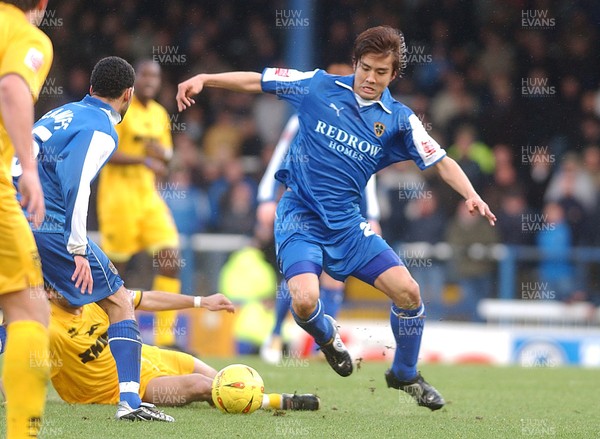 120205 - Cardiff City v Brighton & Hove Albion - Cardiff's Januchi Inamoto tries to break Brighton's defence