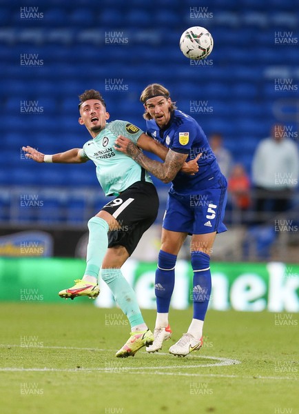 240821 - Cardiff City v Brighton and Hove Albion, EFL Carabao Cup - Aden Flint of Cardiff City and Andi Zeqiri of Brighton compete for the ball