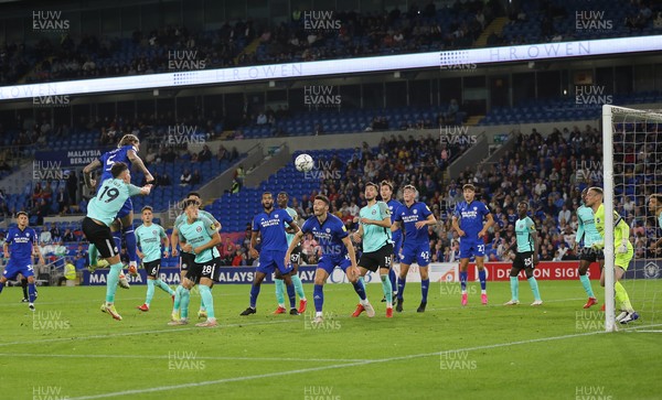240821 - Cardiff City v Brighton and Hove Albion, EFL Carabao Cup - Aden Flint of Cardiff Cityheads at goal but its saved by Brighton goalkeeper Jason Steele