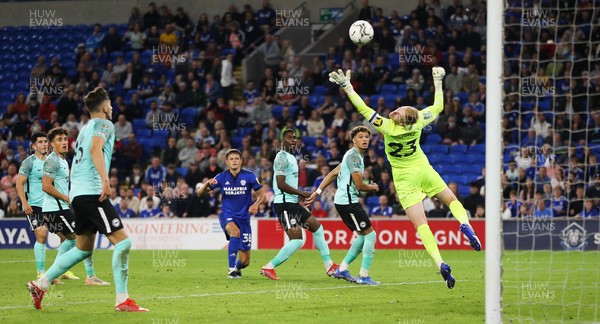 240821 - Cardiff City v Brighton and Hove Albion, EFL Carabao Cup - Perry Ng of Cardiff City sees his shot at goal saved by Jason Steele of Brighton