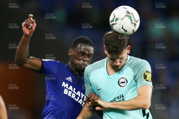 240821 - Cardiff City v Brighton and Hove Albion, EFL Carabao Cup - Tavio D’Almeida of Cardiff City and Jakub Moder of Brighton compete for the ball