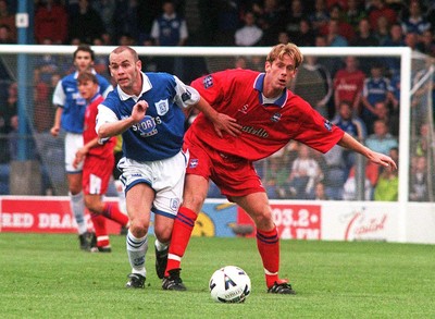 031098 - Cardiff City v Brighton and Hove Albion - League Division 3 -  Wayne O'Sullivan of Cardiff is held off by Jamie Moralee