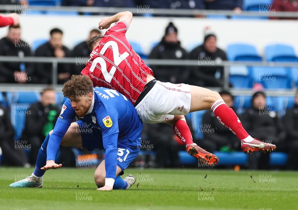 040323 - Cardiff City v Bristol City, EFL Sky Bet Championship - Connor Wickham of Cardiff City and Tomas Kalas of Bristol City compete for the ball
