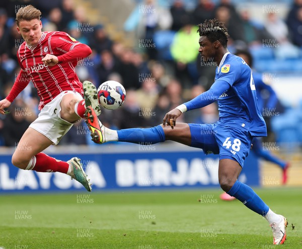 040323 - Cardiff City v Bristol City, EFL Sky Bet Championship - Sory Kaba of Cardiff City is challenged by Cameron Pring of Bristol City