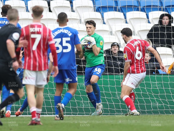 040323 - Cardiff City v Bristol City, EFL Sky Bet Championship - Stand in goalkeeper Perry Ng of Cardiff City claims the ball after Cardiff City goalkeeper Ryan Allsop is shown a red card in extra time