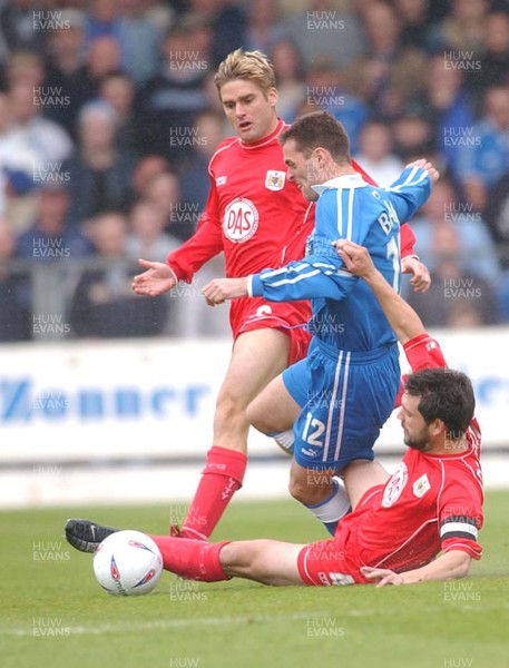 100503 - Cardiff City v Bristol City - Division Two Playoff Semi Final First Leg - Cardiff's Willie Boland is felled by Bristol's Tom Doherty