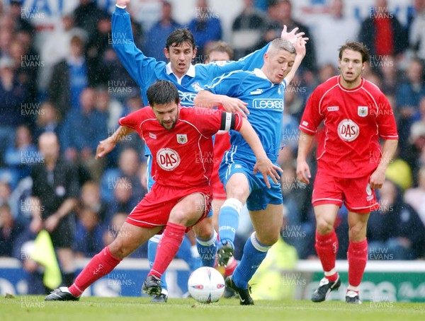 100503 - Cardiff City v Bristol City - Division Two Playoff Semi Final First Leg - Cardiff's Graham Kavanagh challenges Tom Doherty for possession