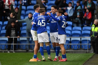 150225 - Cardiff City v Bristol City - Sky Bet Championship - Yousef Salech of Cardiff City celebrates scoring a goal with team mates