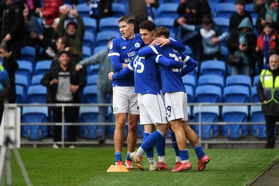 150225 - Cardiff City v Bristol City - Sky Bet Championship - Yousef Salech of Cardiff City celebrates scoring a goal with team mates