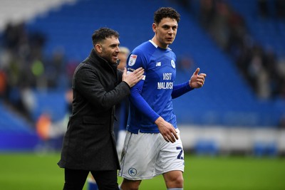 150225 - Cardiff City v Bristol City - Sky Bet Championship - Omar Riza, Cardiff City Manager and Yousef Salech of Cardiff City at full time