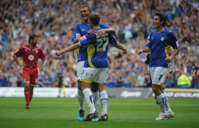23.08.09 - Cardiff City v Bristol City - Coca-Cola Championship - Jay Bothroyd of Cardiff City and Adam Matthews celebrate Jamie McCombe of Bristol City's own goal. 