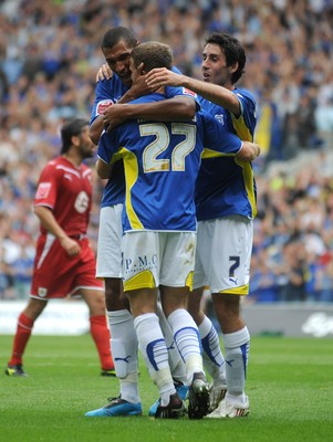 23.08.09 - Cardiff City v Bristol City - Coca-Cola Championship - Jay Bothroyd, Adam Matthews and Peter Whittingham of Cardiff City celebrate Jamie McCombe of Bristol City's own goal. 