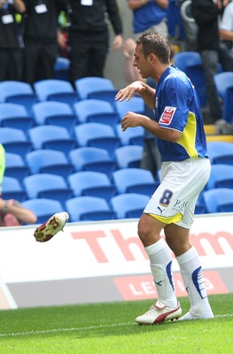 23.08.09 - Cardiff City v Bristol City, Coca Cola Championship -  Cardiff's Michael Chopra drops his "hot" right foot boot as he celebrates goal 