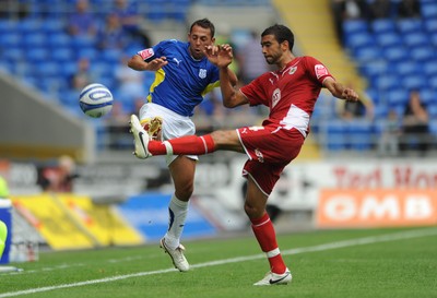 23.08.09 - Cardiff City v Bristol City - Coca-Cola Championship - Michael Chopra of Cardiff City competes with Liam Fontaine of Bristol City. 