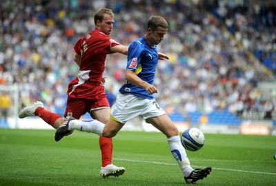 23.08.09 - Cardiff City v Bristol City - Coca-Cola Championship - Adam Matthews of Cardiff City gets past Brian Wilson of Bristol City. 