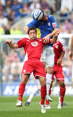 23.08.09 - Cardiff City v Bristol City, Coca Cola Championship -  Cardiff's Paul Quinn gets above Bristol's Lee Johnson  