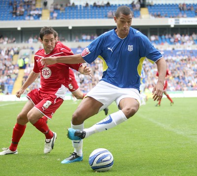 23.08.09 - Cardiff City v Bristol City, Coca Cola Championship -  Cardiff's Jay Bothroyd holds off Bristol's Lee Johnson  