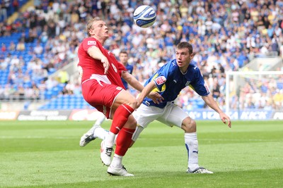 23.08.09 - Cardiff City v Bristol City, Coca Cola Championship -  Cardiff's Paul Quinn and Bristol's Brian Wilson compete for the ball 