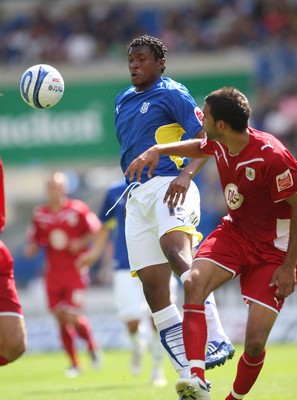 23.08.09 - Cardiff City v Bristol City, Coca Cola Championship -  Cardiff's Kelvin Etuhu gets the better of Bristol's Liam Fontaine  