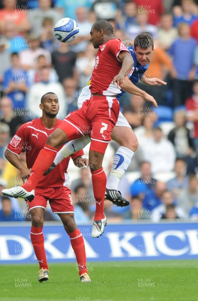 23.08.09 - Cardiff City v Bristol City - Coca-Cola Championship - Marvin Elliott of Bristol City and Mark Hudson of Cardiff City compete for the ball. 