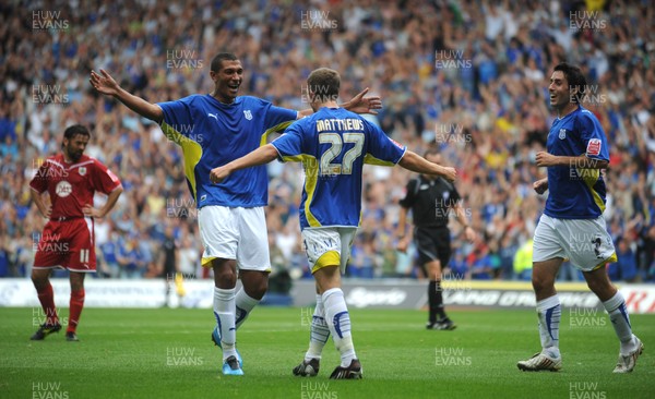 23.08.09 - Cardiff City v Bristol City - Coca-Cola Championship - Jay Bothroyd of Cardiff City and Adam Matthews celebrate Jamie McCombe of Bristol City's own goal. 
