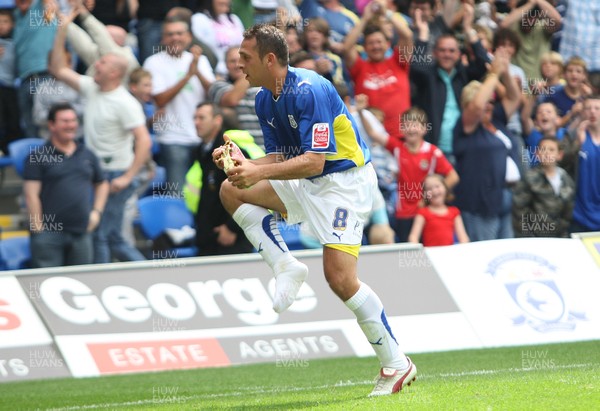 23.08.09 - Cardiff City v Bristol City, Coca Cola Championship -  Cardiff's Michael Chopra removes his "hot" right foot boot as he celebrates goal 