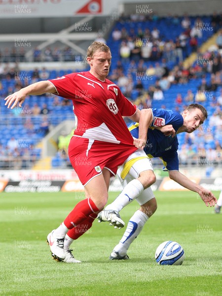 23.08.09 - Cardiff City v Bristol City, Coca Cola Championship -  Cardiff's Paul Quinn and Bristol's Brian Wilson compete for the ball 