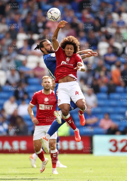280821 - Cardiff City v Bristol City - SkyBet Championship - Han-Noah Massengo of Bristol City and Marlon Pack of Cardiff City go up for the ball
