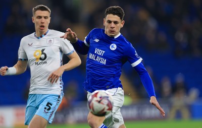 040325 Cardiff City v Burnley, EFL Sky Bet Championship - Yousef Salech of Cardiff City and Maxime Esteve of Burnley compete for the ball