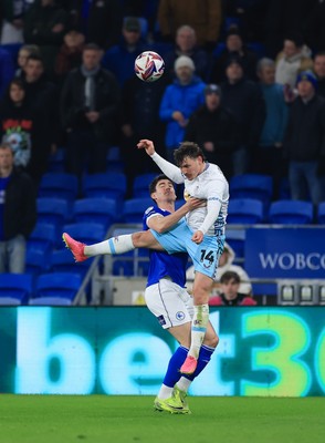 040325 Cardiff City v Burnley, EFL Sky Bet Championship - Connor Roberts of Burnley and Callum O'Dowda of Cardiff City compete for the ball