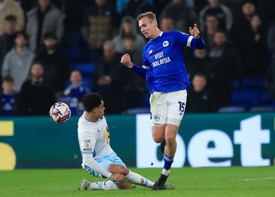 040325 Cardiff City v Burnley, EFL Sky Bet Championship - Sivert Mannsverk of Cardiff City is challenged by CJ Egan-Riley of Burnley