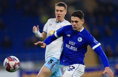 040325 Cardiff City v Burnley, EFL Sky Bet Championship - Yousef Salech of Cardiff City and Maxime Esteve of Burnley compete for the ball