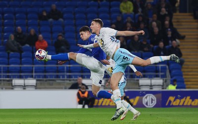 040325 Cardiff City v Burnley, EFL Sky Bet Championship - Yousef Salech of Cardiff City hits the post with this effort as he beats Maxime Esteve of Burnley