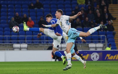 040325 Cardiff City v Burnley, EFL Sky Bet Championship - Yousef Salech of Cardiff City hits the post with this effort as he beats Maxime Esteve of Burnley