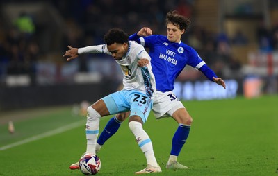 040325 Cardiff City v Burnley, EFL Sky Bet Championship - Lucas Pires of Burnley holds off Perry Ng of Cardiff City