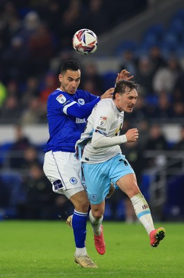 040325 Cardiff City v Burnley, EFL Sky Bet Championship - Anwar El Ghazi of Cardiff City and Connor Roberts of Burnley compete for the ball