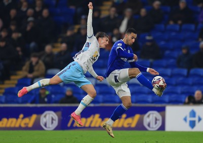 040325 Cardiff City v Burnley, EFL Sky Bet Championship - Anwar El Ghazi of Cardiff City and Connor Roberts of Burnley compete for the ball