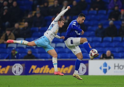 040325 Cardiff City v Burnley, EFL Sky Bet Championship - Anwar El Ghazi of Cardiff City and Connor Roberts of Burnley compete for the ball