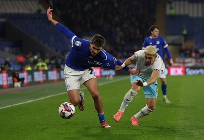 040325 Cardiff City v Burnley, EFL Sky Bet Championship - Rubin Colwill of Cardiff City and Jeremy Sarmiento of Burnley compete for the ball