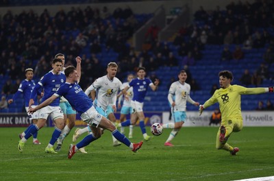 040325 Cardiff City v Burnley, EFL Sky Bet Championship - Will Fish of Cardiff City goes close in the final minutes of the match as he beats Burnley goalkeeper James Trafford