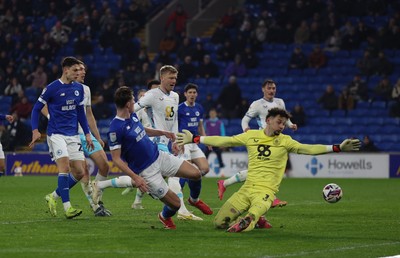 040325 Cardiff City v Burnley, EFL Sky Bet Championship - Will Fish of Cardiff City goes close in the final minutes of the match as he beats Burnley goalkeeper James Trafford