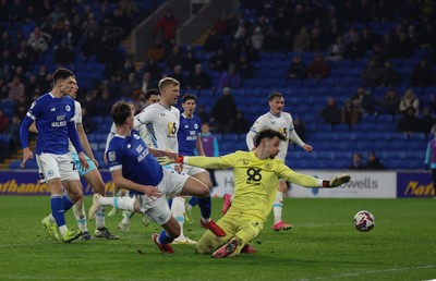 040325 Cardiff City v Burnley, EFL Sky Bet Championship - Will Fish of Cardiff City goes close in the final minutes of the match as he beats Burnley goalkeeper James Trafford