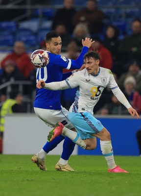 040325 Cardiff City v Burnley, EFL Sky Bet Championship - Anwar El Ghazi of Cardiff City and Connor Roberts of Burnley compete for the ball