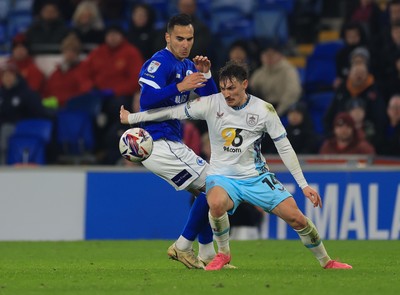 040325 Cardiff City v Burnley, EFL Sky Bet Championship - Anwar El Ghazi of Cardiff City and Connor Roberts of Burnley compete for the ball