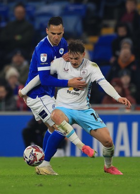 040325 Cardiff City v Burnley, EFL Sky Bet Championship - Anwar El Ghazi of Cardiff City and Connor Roberts of Burnley compete for the ball