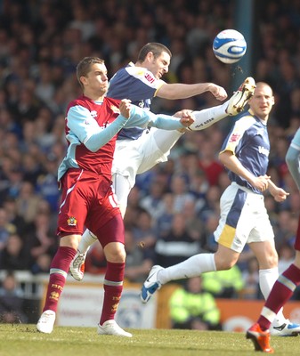 13.04.09 - Championship Football -  Cardiff City v Burnley -  Burnley's Jay Rodriguez and Cardiff's Mark Kennedy compete 