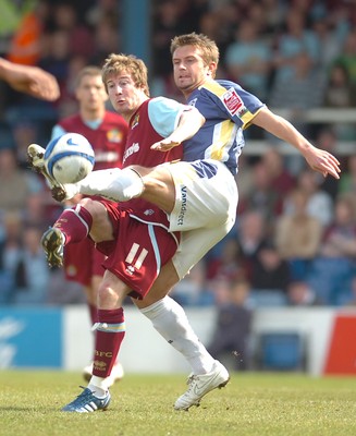 13.04.09 - Championship Football -  Cardiff City v Burnley -  Burnley's Wade Elliott and Cardiff's Stephen McPhail compete 
